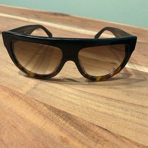 Celine tortoise and black luxury sunglasses. Made in Italy, slight shade.